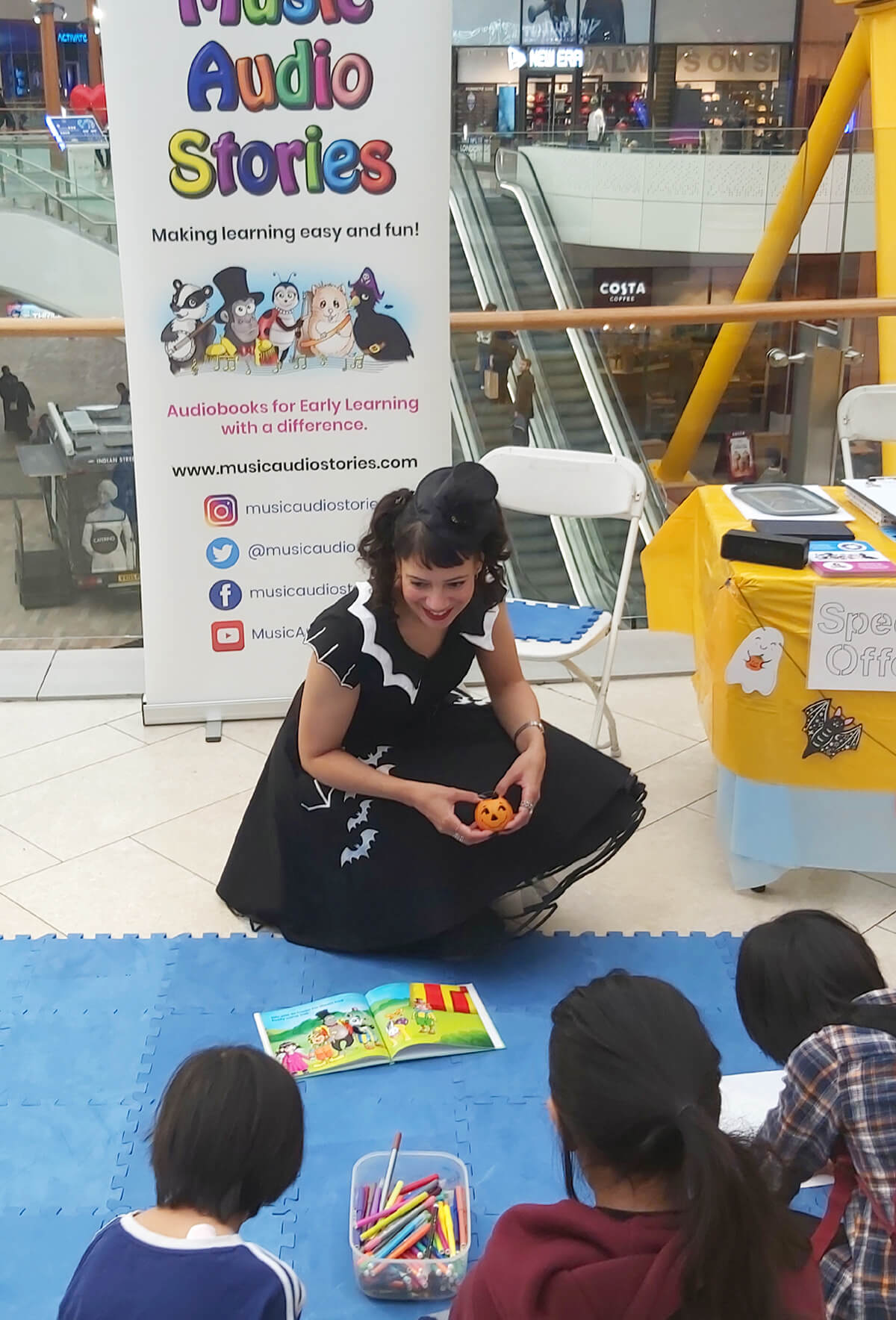 Anna Christina drawing with the children at The O2 image
