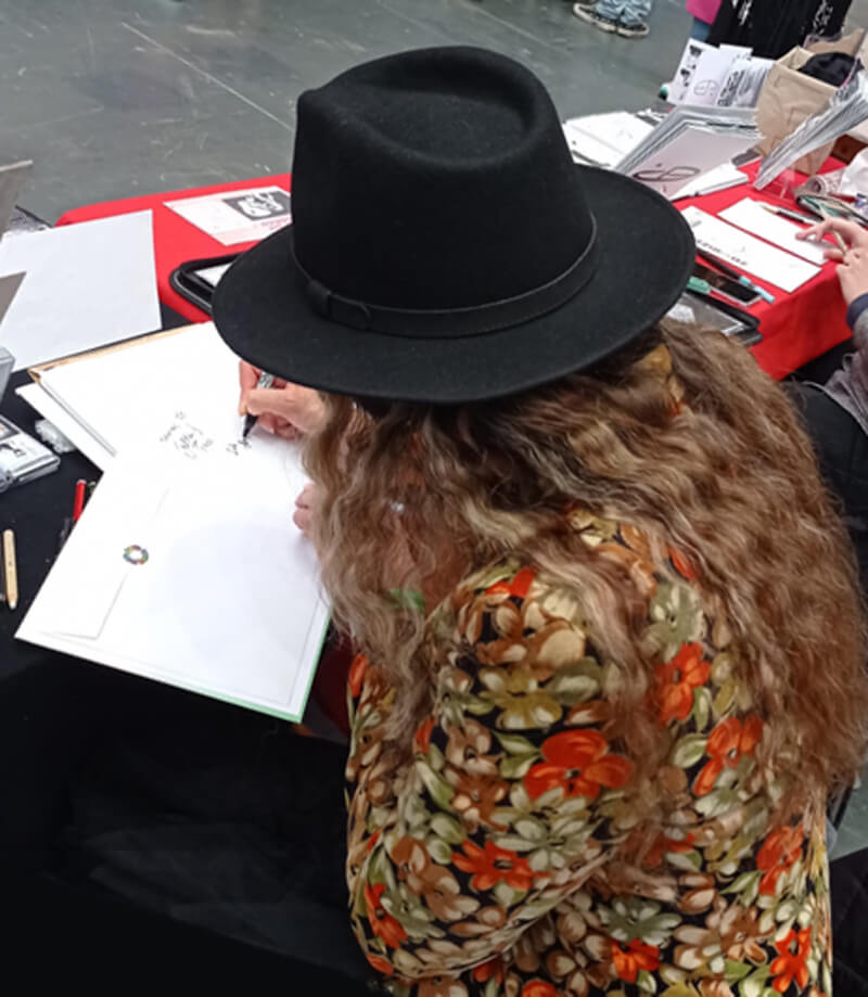 Anna Christina from Music Audio Stories signing copies of Billy Joins the Circus image