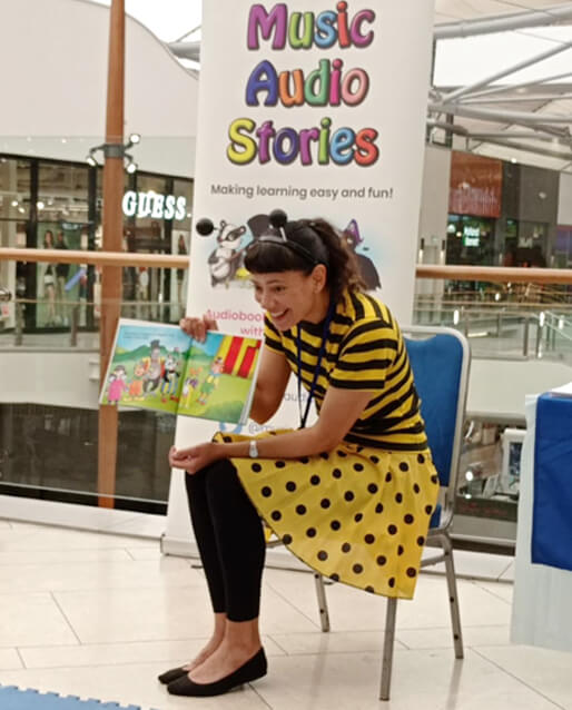 Anna Christina doing a read-aloud of the Billy Joins the Circus picture book image