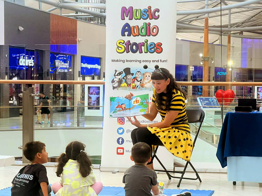 Children's author, Anna Christina, from Music Audio Stories, doing a read-aloud at The O2 image