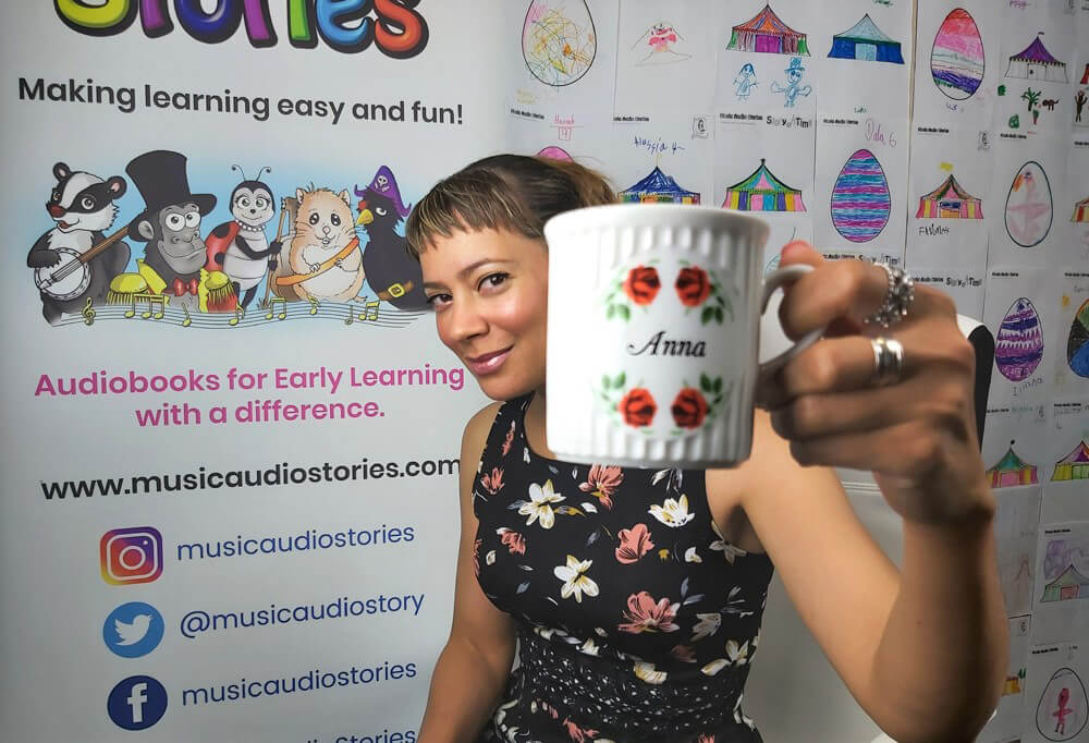 Anna Christina from Music Audio Stories on her YouTube video film set drinking tea image